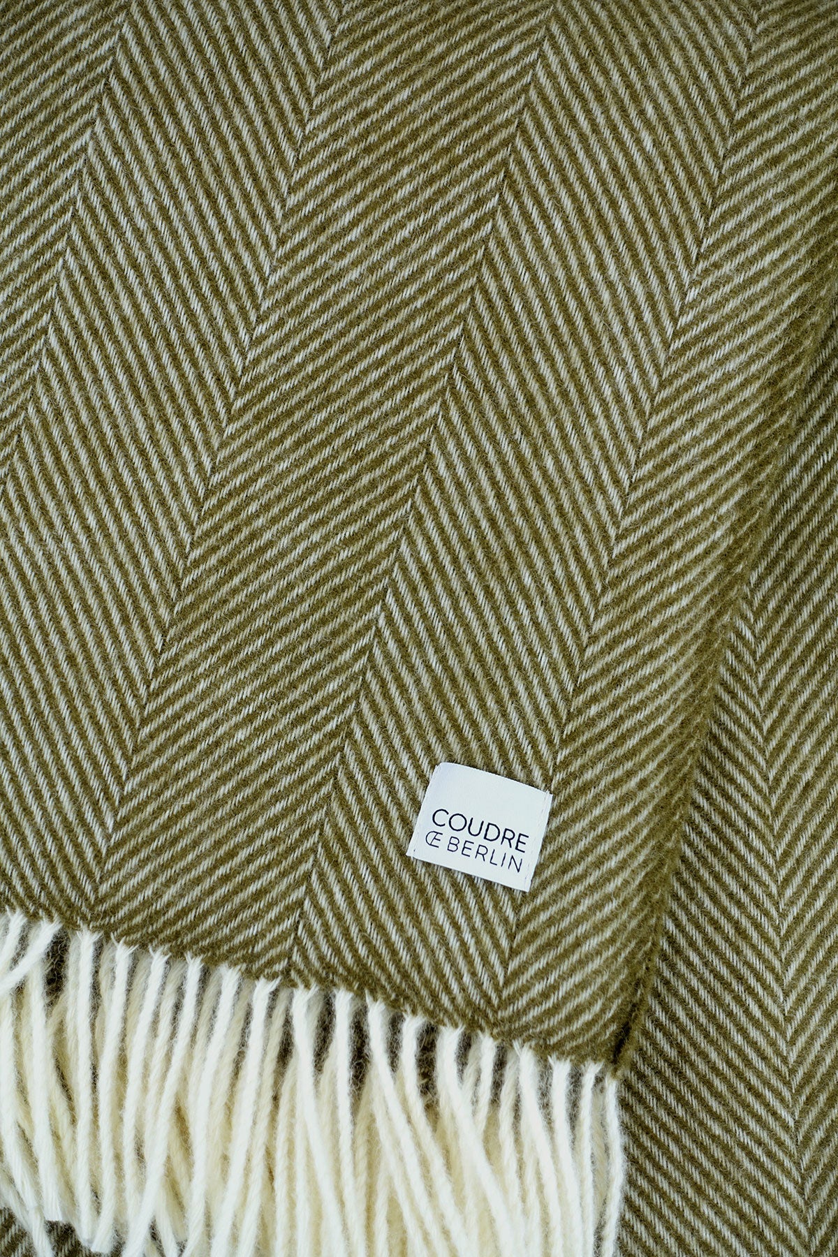 Wollen deken visgraat olijf