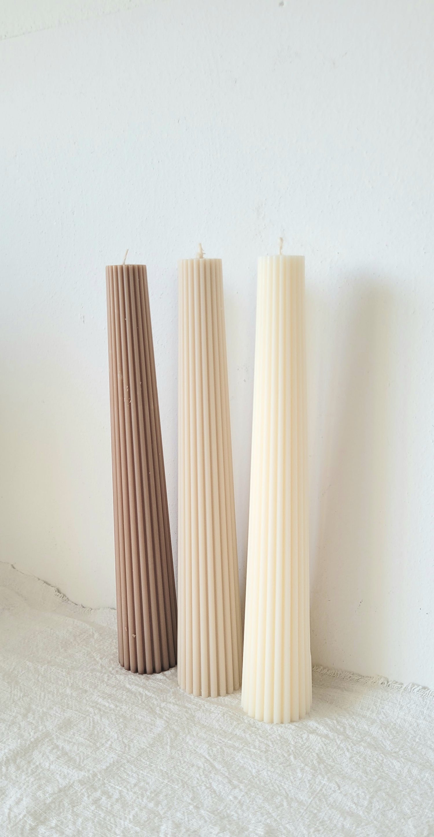 Ribbed taper candle