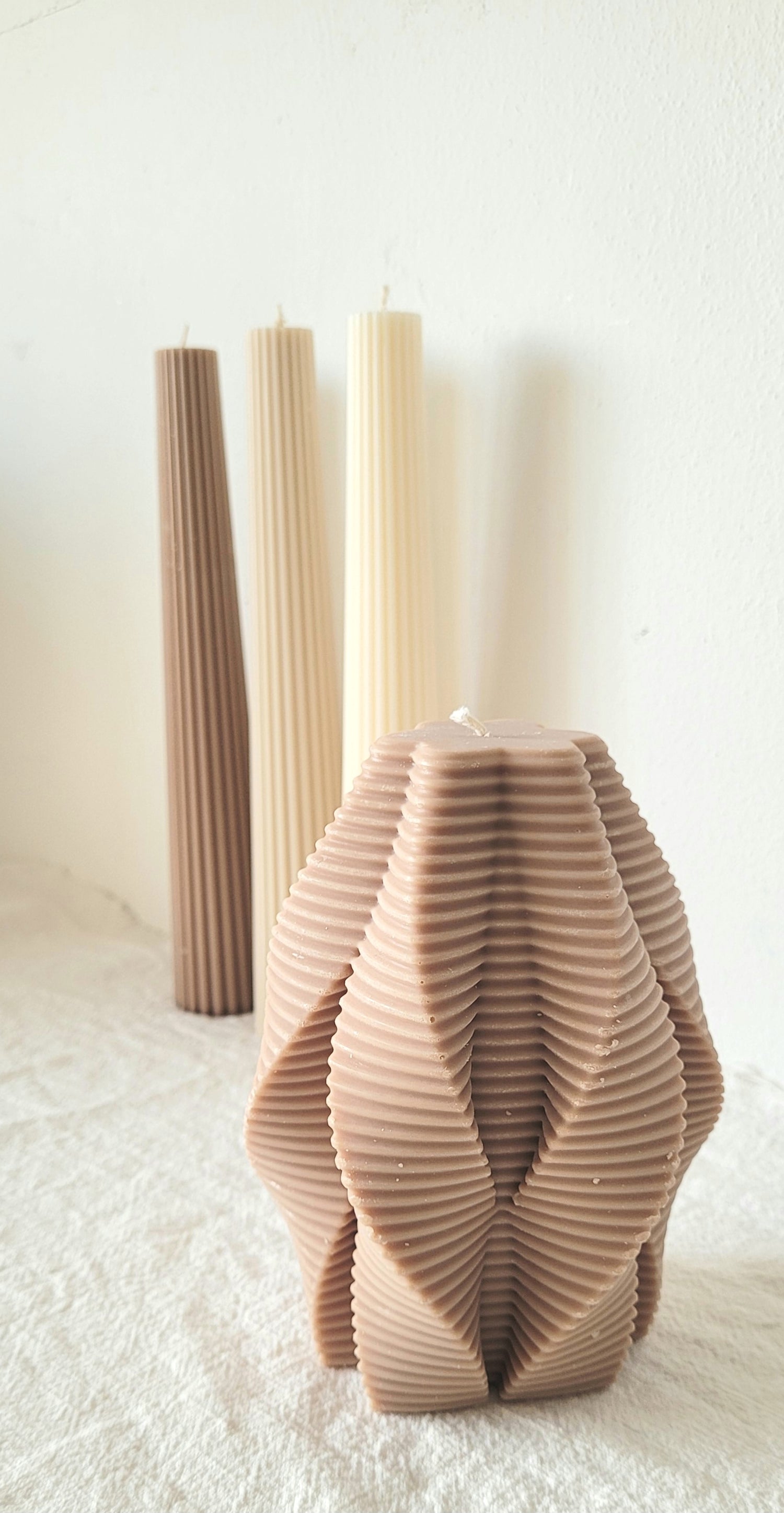 Ribbed taper candle