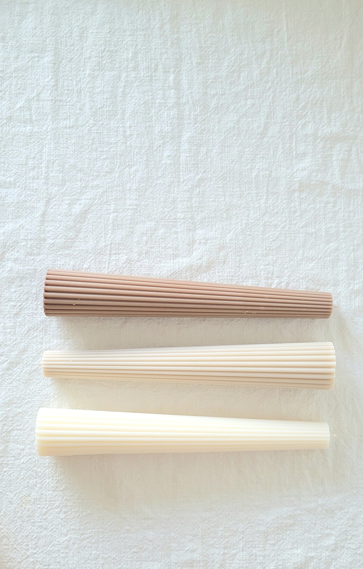 Ribbed taper candle